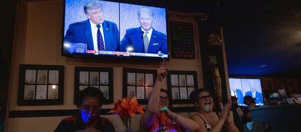 Women for Trump cheer for the president at a Debate Watch Party during the Presidential debate between U.S. President Donald Trump and Democratic Presidential candidate Joe Biden, in the City of Industry, California, U.S., September 29, 2020 - Sputnik International