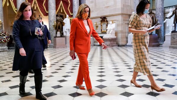 U.S. House Speaker Nancy Pelosi (D-CA) walks though the U.S. Capitol in Washington, U.S. September 30, 2020. - Sputnik International