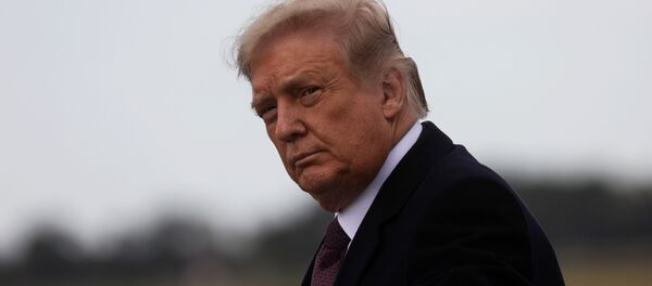 U.S. President Donald Trump arrives on campaign travel at Morristown Municipal Airport in Morristown, New Jersey, U.S., October 1, 2020. - Sputnik International