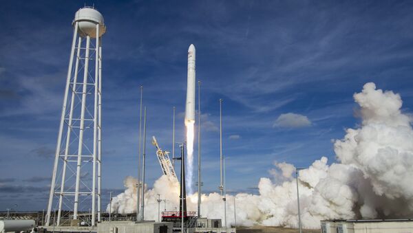 The Northrop Grumman Antares rocket, with Cygnus resupply spacecraft onboard, launches from Pad-0A at NASA's Wallops Flight Facility in Wallops Island, Va, Saturday, Feb. 15, 2020. - Sputnik International