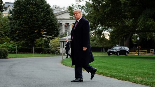 U.S. President Donald Trump walks from Marine One as he returns from Bedminster, New Jersey, on the South Lawn of the White House in Washington, U.S., October 1, 2020. - Sputnik International