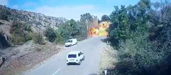 Screenshot of video showing alleged Azerbaijani attack on bridge connecting Armenia proper to the breakaway region of Nagorno-Karabakh. Screenshot of video showing alleged Azerbaijani attack on bridge connecting Armenia proper to the breakaway region of Nagorno-Karabakh. - Sputnik International