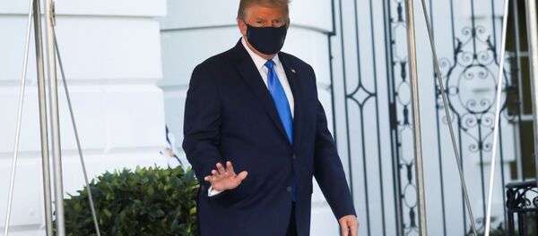 U.S. President Donald Trump waves as he walks out to the Marine One helicopter to fly to Walter Reed National Military Medical Center after testing positive for the coronavirus disease (COVID-19), from the South Lawn at the White House in Washington, U.S., October 2, 2020. U.S. President Donald Trump waves as he walks out to the Marine One helicopter to fly to Walter Reed National Military Medical Center after testing positive for the coronavirus disease (COVID-19), from the South Lawn at the White House in Washington, U.S., October 2, 2020. - Sputnik International