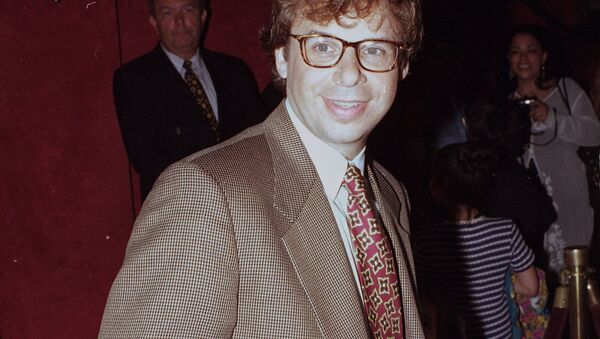 In this May 1994 file photo, actor Rick Moranis is shown at an unknown location.  A law enforcement official tells the Associated Press that Moranis was sucker punched by an unknown assailant while walking Thursday, Oct. 1, 2020, on a sidewalk near New York’s Central Park - Sputnik International