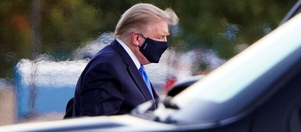 US President Donald Trump arrives at Walter Reed National Military Medical Center by helicopter after the White House announced that he will be working from the presidential offices at Walter Reed for the next few days after testing positive for the coronavirus disease (COVID-19), in Bethesda, Maryland, US, October 2, 2020 - Sputnik International