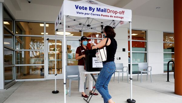 Katie Tricarico prepares to cast her mail-in voter ballot the last day of early voting for the U.S. presidential election at the C. Blythe Andrews, Jr. Public Library in East Tampa, Florida, U.S., August 16, 2020. - Sputnik International