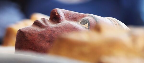 Sarcophagi that are around 2500 years old, are seen inside the newly discovered burial site near Egypt's Saqqara necropolis, in Giza, Egypt, October 3, 2020. Sarcophagi that are around 2500 years old, are seen inside the newly discovered burial site near Egypt's Saqqara necropolis, in Giza, Egypt, October 3, 2020. - Sputnik International