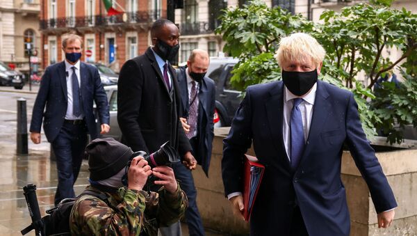 British Prime Minister Boris Johnson is seen outside the BBC headquarters, as the spread of the coronavirus disease (COVID-19) continues, in London, Britain, October 4, 2020 - Sputnik International