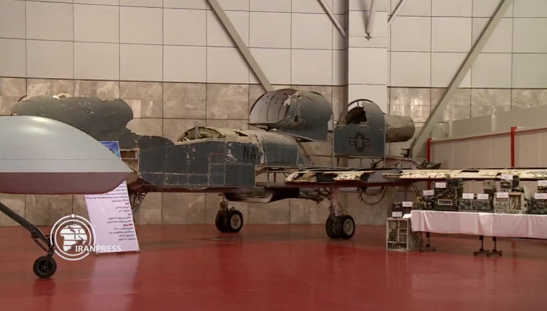 Painstakingly reconstructed remnants of US drone shot down over Iran by a domestically-made air defence system in June 2019 on display at Tehran's National Aerospace Park. - Sputnik International, 1920, 09.11.2021