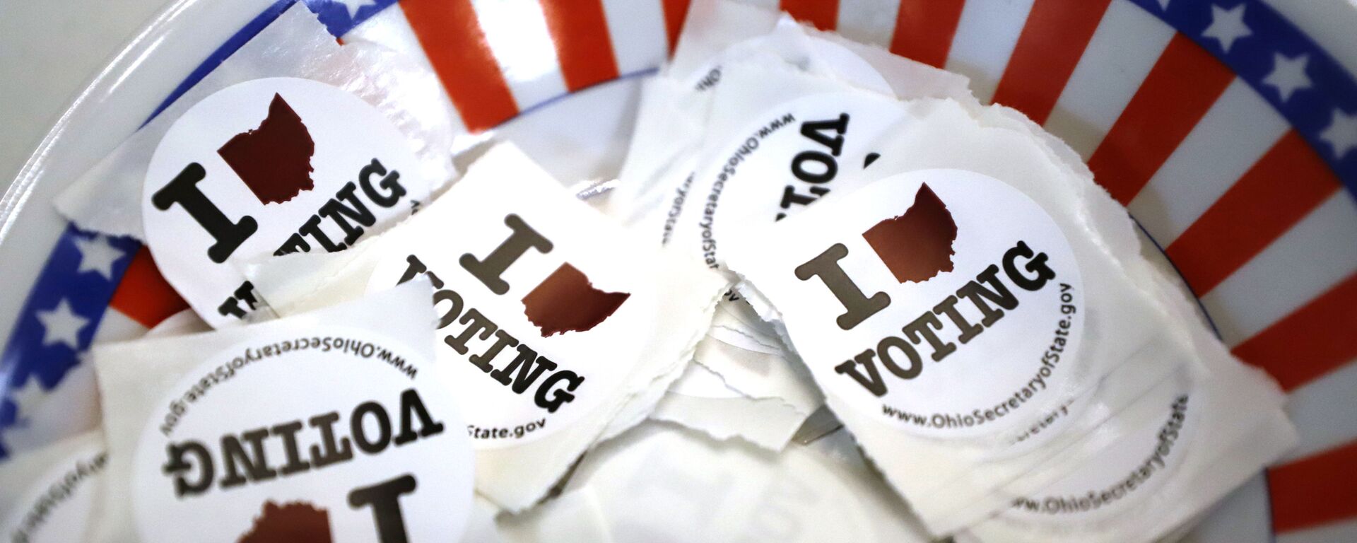 This is a bowl of stickers for those taking advantage of early voting, Sunday, March 15, 2020, in Steubenville, Ohio - Sputnik International, 1920, 05.06.2022