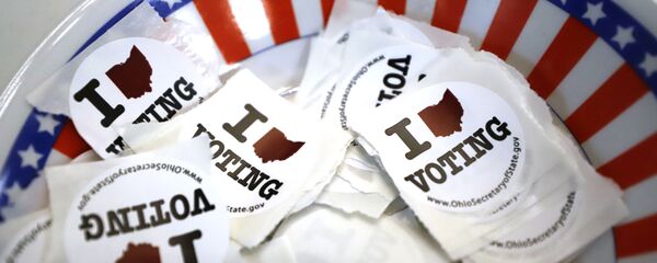This is a bowl of stickers for those taking advantage of early voting, Sunday, March 15, 2020, in Steubenville, Ohio - Sputnik International