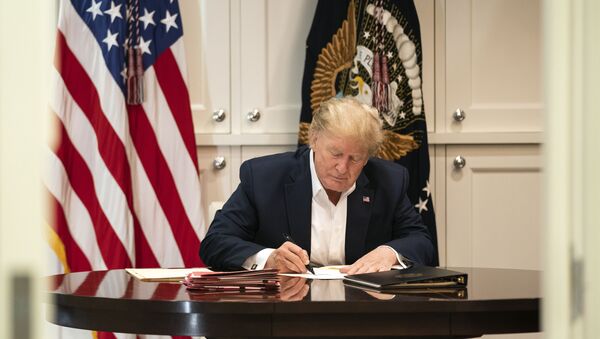 In this image released by the White House, President Donald Trump works in the Presidential Suite at Walter Reed National Military Medical Center in Bethesda, Md. Saturday, Oct. 3, 2020 - Sputnik International