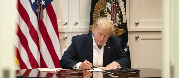 In this image released by the White House, President Donald Trump works in the Presidential Suite at Walter Reed National Military Medical Center in Bethesda, Md. Saturday, Oct. 3, 2020 In this image released by the White House, President Donald Trump works in the Presidential Suite at Walter Reed National Military Medical Center in Bethesda, Md. Saturday, Oct. 3, 2020 - Sputnik International