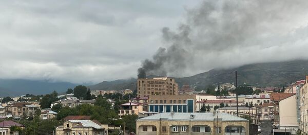 Smoke rises after the recent shelling, in Stepanakert, the self-proclaimed Republic of Nagorno-Karabakh. The situation in Nagorno-Karabakh escalated on September 27, when Yerevan and Baku accused each other of provoking military hostilities. Smoke rises after the recent shelling, in Stepanakert, the self-proclaimed Republic of Nagorno-Karabakh. The situation in Nagorno-Karabakh escalated on September 27, when Yerevan and Baku accused each other of provoking military hostilities. - Sputnik International