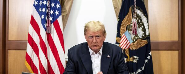 In this image provided by the White House, President Donald Trump listens during a phone call with Vice President Mike Pence, Secretary of State Mike Pompeo, and Chairman of the Joint Chiefs of Staff Gen. Mark Milley, Sunday, Oct. 4, 2020 In this image provided by the White House, President Donald Trump listens during a phone call with Vice President Mike Pence, Secretary of State Mike Pompeo, and Chairman of the Joint Chiefs of Staff Gen. Mark Milley, Sunday, Oct. 4, 2020 - Sputnik International