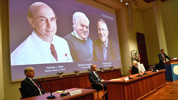 Thomas Perlmann, Secretary of the Nobel Assembly at Karolinska Institutet and of the Nobel Committee for Physiology or Medicine, announces Harvey J? Alter, Michael Houghton and Charles M? Rice as the winners of the 2020 Nobel Prize in Physiology or Medicine during a news conference at the Karolinska Institute in Stockholm, Sweden, October 5, 2020 - Sputnik International