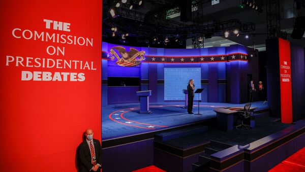 Janet Brown, the Executive Director of the Commission on Presidential Debates, addresses the audience at the start of the first 2020 presidential campaign debate between U.S. President Donald Trump and Democratic presidential nominee Joe Biden, held on the campus of the Cleveland Clinic at Case Western Reserve University in Cleveland, Ohio, U.S., September 29, 2020.  - Sputnik International
