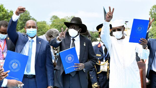 Sudan's Sovereign Council Chief General Abdel Fattah al-Burhan, South Sudan's President Salva Kiir, and Chad President Idriss Deby attend the signing of peace agreement between the Sudan's transitional government and Sudanese revolutionary movements to end decades-old conflict, in Juba, South Sudan October 3, 2020. - Sputnik International