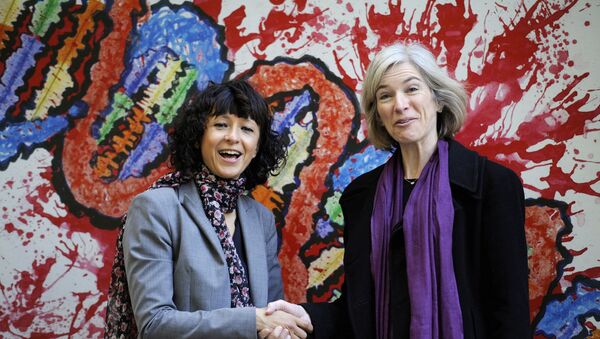 FILE PHOTO: French microbiologist Emmanuelle Charpentier (L) and professor Jennifer Doudna of the U.S. pose for the media during a visit to a painting exhibition by children about the genome, at the San Francisco park in Oviedo, SPAIN, October 21, 2015 - Sputnik International