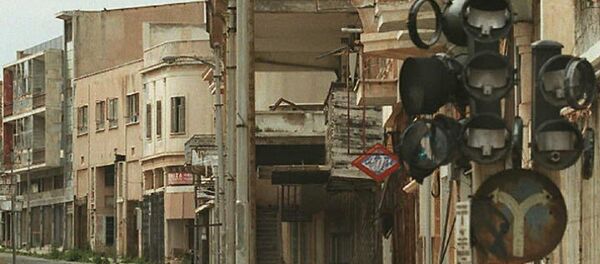 A street of the deserted Cypriot sea resort of Varosha on the southeastern coast of the Meditarranean island under Turkish-Cypriot control and dubbed The Ghost Town is overun by weeds 01 March - Sputnik International