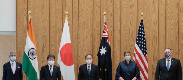 (L-R) India's Foreign Minister Subrahmanyam Jaishankar, Japan's Foreign Minister Toshimitsu Motegi, Japan's Prime Minister Yoshihide Suga, Australia's Foreign Minister Marise Payne and US Secretary of State Mike Pompeo pose for photographs before a Quad Indo-Pacific meeting at the prime minister's office in Tokyo on October 6, 2020 in Tokyo. (L-R) India's Foreign Minister Subrahmanyam Jaishankar, Japan's Foreign Minister Toshimitsu Motegi, Japan's Prime Minister Yoshihide Suga, Australia's Foreign Minister Marise Payne and US Secretary of State Mike Pompeo pose for photographs before a Quad Indo-Pacific meeting at the prime minister's office in Tokyo on October 6, 2020 in Tokyo. - Sputnik International