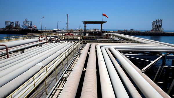 FILE PHOTO: An oil tanker is being loaded at Saudi Aramco's Ras Tanura oil refinery and oil terminal in Saudi Arabia May 21, 2018 - Sputnik International