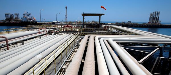 FILE PHOTO: An oil tanker is being loaded at Saudi Aramco's Ras Tanura oil refinery and oil terminal in Saudi Arabia May 21, 2018 - Sputnik International