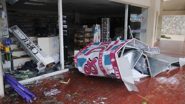A storefront stands shattered by Hurricane Delta in Cancun, Mexico, Wednesday, Oct. 7, 2020. Hurricane Delta made landfall Wednesday just south of the Mexican resort of Cancun as a Category 2 storm, downing trees and knocking out power to some resorts along the northeastern coast of the Yucatan Peninsula. - Sputnik International
