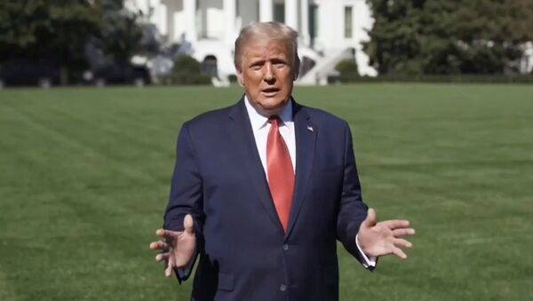 U.S. President Donald Trump speaks outside the White House, where he is being treated for the coronavirus disease (COVID-19), in Washington, U.S. in this still image taken from social media video released on October 8, 2020 - Sputnik International