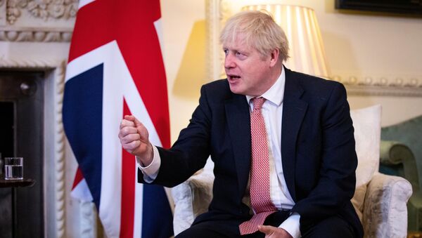 Britain's Prime Minister Boris Johnson meets Ukraine's President Volodymyr Zelenskiy (not pictured) in Downing Street in London, Britain October 8, 2020. - Sputnik International