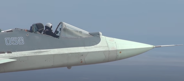 Sukhoi Su-57 fighter jet flying without a canopy during testing. - Sputnik International