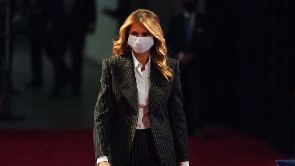 In this Sept. 29, 2020, file photo, first lady Melania Trump, wearing a facemask, walks towards her seat for the during the first presidential debate Tuesday, Sept. 29, 2020, at Case Western University and Cleveland Clinic, in Cleveland, Ohio - Sputnik International