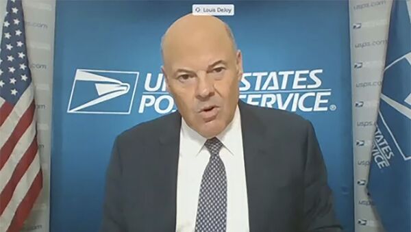 In this image from video, U.S. Postmaster General Louis DeJoy testifies during a virtual hearing before the Senate Governmental Affairs Committee on the U.S. Postal Service during COVID-19 and the upcoming elections, Friday, Aug. 21, 2020 on Capitol Hill in Washington.  - Sputnik International