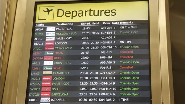 Several airlines with canceled flights are shown on a departures board at JFK airport's Terminal 1, Friday, March 13, 2020, in New York. The coronavirus outbreak is affecting the airline industry hard. Travelers from most European countries to the United States are banned for the next 30 days after President Trump announced the ban earlier in the week. Returning passengers will be screened. The global travel industry is already reeling from falling bookings and canceled reservations as people try to avoid contracting and spreading the virus. - Sputnik International