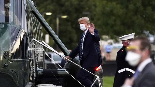 President Donald Trump boards Marine One to return to the White House after receiving treatments for COVID-19 at Walter Reed National Military Medical Center, Monday, 25 October 2020, in Bethesda, Maryland. - Sputnik International