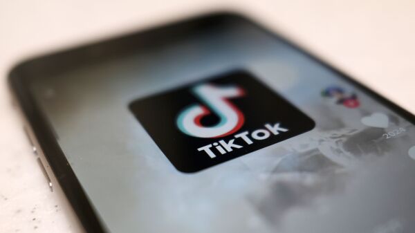 A logo of the smartphone app TikTok is seen on a smartphone screen on 28 September 2020 in Tokyo.  - Sputnik International