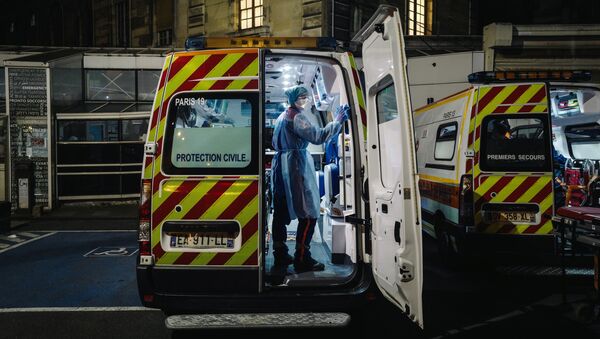 A French first aid worker from the Protection Civile Paris Seine, disinfects an ambulance (File) - Sputnik International