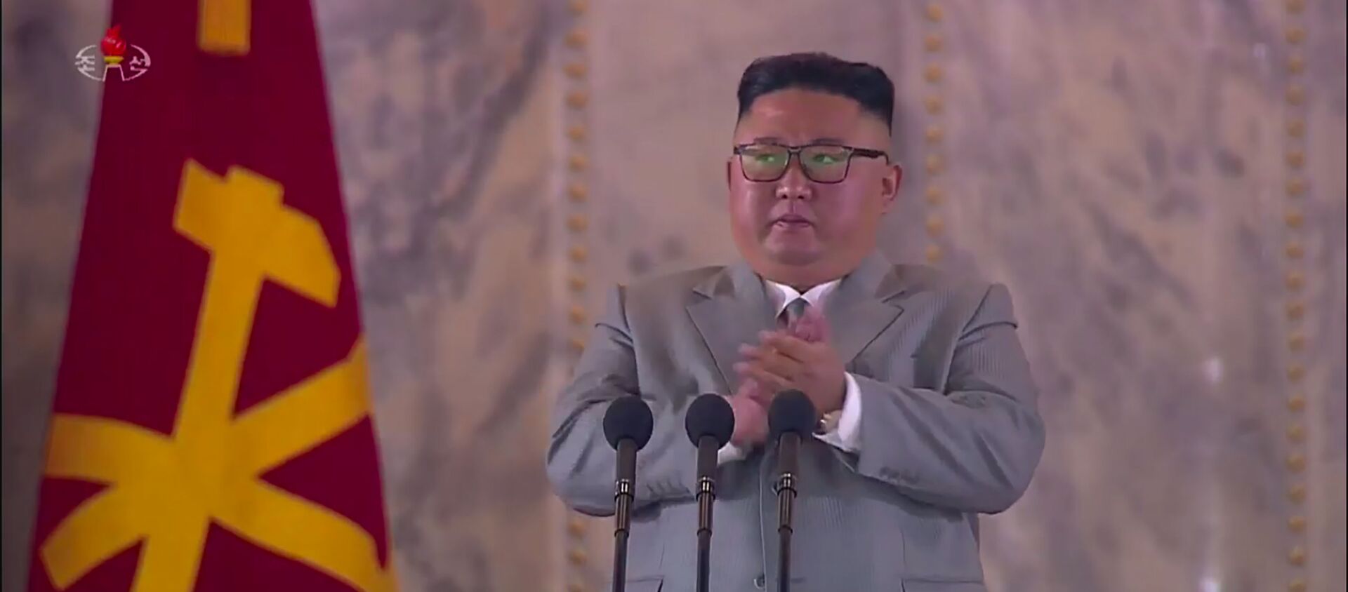 A screen grab taken from a KCNA broadcast on 10 October 2020 shows North Korean leader Kim Jong Un addressing attendees of a military parade on Kim Il Sung square in Pyongyang. - Sputnik International, 1920, 12.10.2020