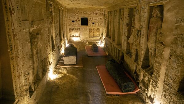 Several sarcophagi are displayed inside a tomb at the Saqqara archaeological site, 30 kilometers (19 miles) south of Cairo, Egypt, on Saturday, 3 October 2020 - Sputnik International