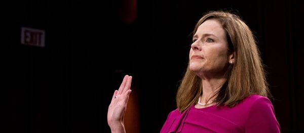 U.S. Supreme Court nominee Amy Coney Barrett is sworn in during her confirmation hearing before the Senate Judiciary Committee on Capitol Hill in Washington , D.C., U.S., October 12, 2020. - Sputnik International