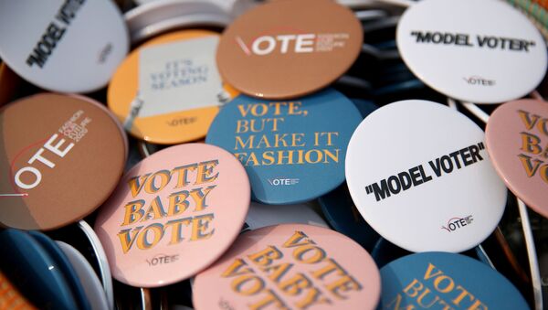 Guests pick up their voting merch and make a statement about the importance of your voice and your vote at Fashion Our Future 2020  - Sputnik International