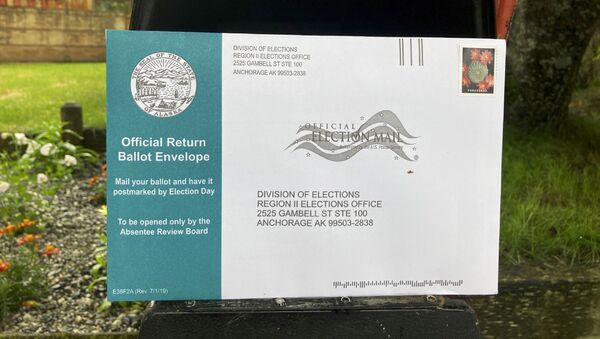 This Tuesday, 11 August 2020 photo shows a completed Alaska Primary absentee ballot before it was put inside a mailbox in Anchorage, Alaska. - Sputnik International
