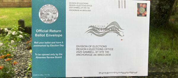 This Tuesday, Aug. 11, 2020 photo shows a completed Alaska Primary absentee ballot before it was put inside a mailbox in Anchorage, Alaska. - Sputnik International