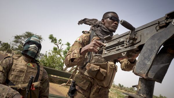 Soldiers of the Malian army are seen during a patrol on the road between Mopti and Djenne, in central Mali, on February 28, 2020 - Sputnik International