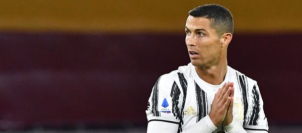 Juventus' Portuguese forward Cristiano Ronaldo reacts during the Italian Serie A football match Roma vs Juventus on September 27, 2020 at the Olympic stadium in Rome.  - Sputnik International