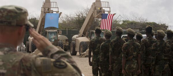 Somali national army soldiers stand in formation during a logistics course graduation ceremony. Soldiers from Somali’s advanced infantry DANAB battalion spent 14 weeks training with the U.S. 10th Mountain division on the importance of logistical operation as well as the operation and maintenance of heavy equipment. Somali national army soldiers stand in formation during a logistics course graduation ceremony. Soldiers from Somali’s advanced infantry DANAB battalion spent 14 weeks training with the U.S. 10th Mountain division on the importance of logistical operation as well as the operation and maintenance of heavy equipment. - Sputnik International