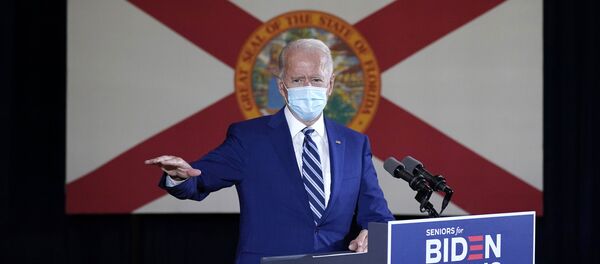 The Florida state flag hands behind Democratic presidential candidate former Vice President Joe Biden as he speaks at Southwest Focal Point Community Center in, Pembroke Pines, Fla., Tuesday Oct. 13, 2020 The Florida state flag hands behind Democratic presidential candidate former Vice President Joe Biden as he speaks at Southwest Focal Point Community Center in, Pembroke Pines, Fla., Tuesday Oct. 13, 2020 - Sputnik International