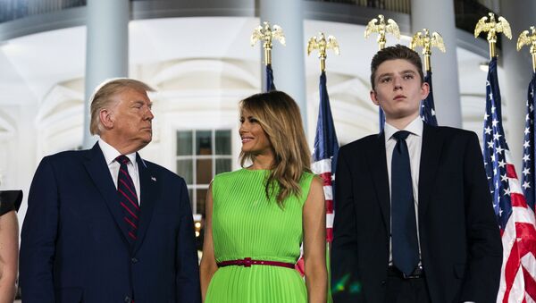  In this Aug. 27, 2020 file photo, Barron Trump right, stands with President Donald Trump and first lady Melania Trump on the South Lawn of the White House on the fourth day of the Republican National Convention in Washington. - Sputnik International