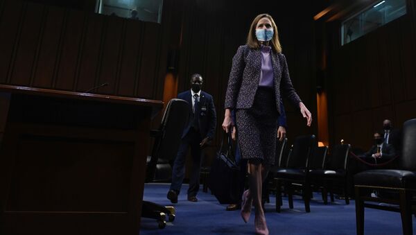Supreme Court nominee Judge Amy Coney Barrett leaves after testifying on the third day of her confirmation hearing before the Senate Judiciary Committee on Capitol Hill on October 14, 2020 in Washington, DC. - Sputnik International
