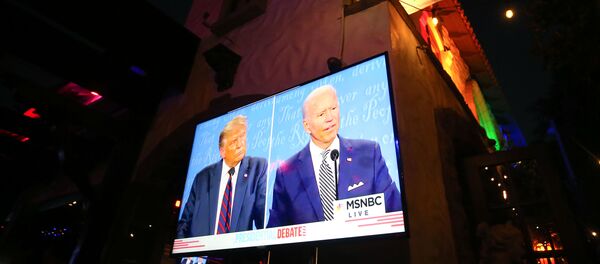 WEST HOLLYWOOD, CALIFORNIA - SEPTEMBER 29: A broadcast of the first debate between President Donald Trump and Democratic presidential nominee Joe Biden is played on a TV at The Abbey, which seated patrons at socially distanced outdoor tables, on September 29, 2020 in West Hollywood, California. WEST HOLLYWOOD, CALIFORNIA - SEPTEMBER 29: A broadcast of the first debate between President Donald Trump and Democratic presidential nominee Joe Biden is played on a TV at The Abbey, which seated patrons at socially distanced outdoor tables, on September 29, 2020 in West Hollywood, California. - Sputnik International